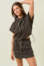 Load image into Gallery viewer, LEOPARD TERRY SHIRT TAIL HEM MINI SKIRT W/ TIE TRIM
