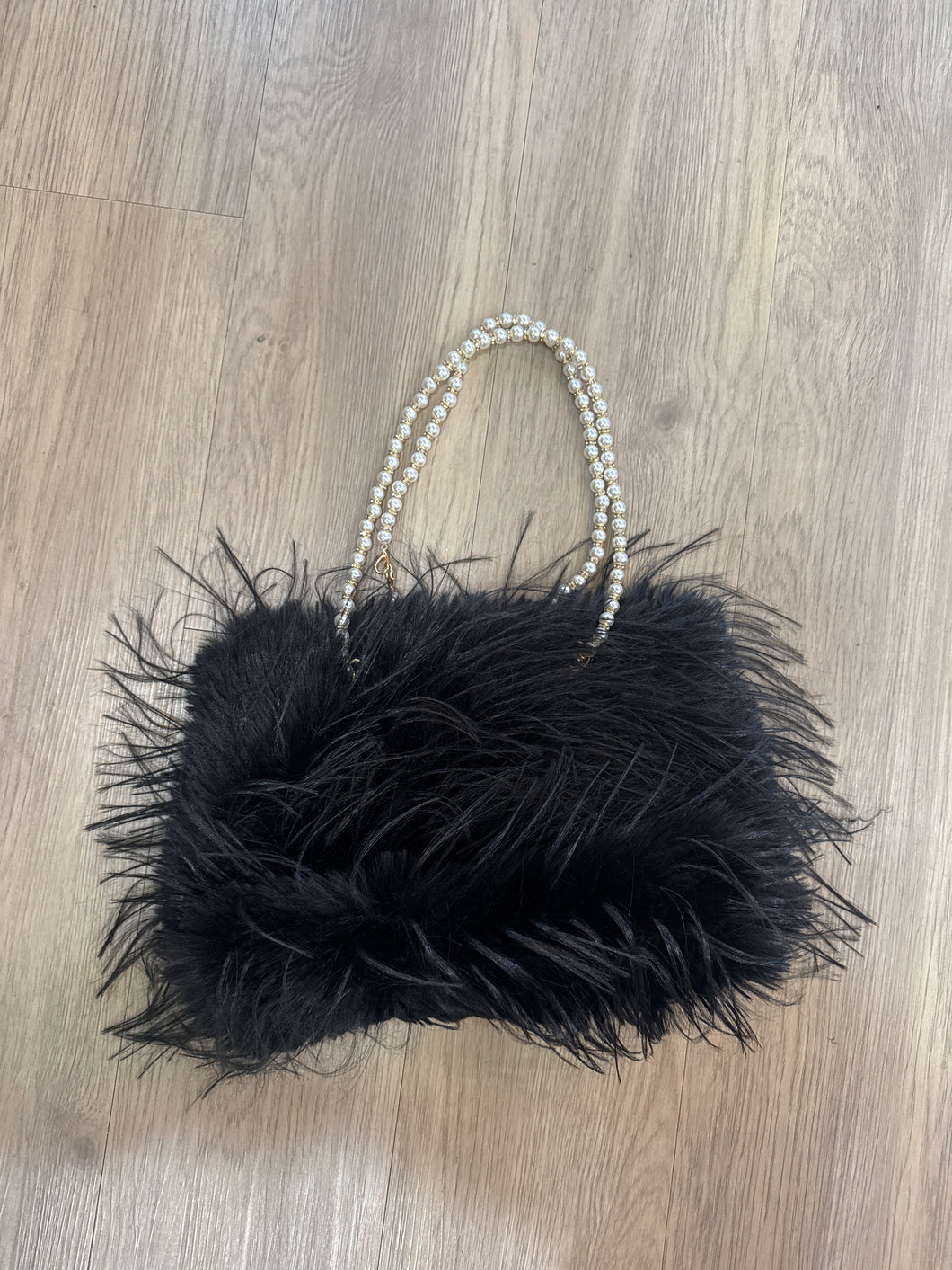 BLACK FUR WITH PEARL STRAP